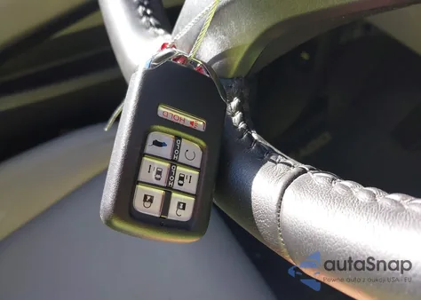 2023 Honda Odyssey Touring from USA, damaged, VIN 5FNRL6H8XPB074923